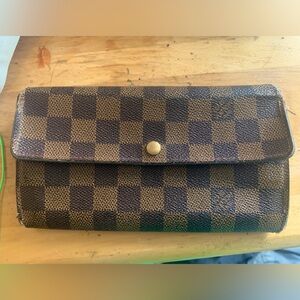 Authentic Louis Vuitton Brown Wallet.